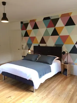 Un ou plusieurs lits dans un hébergement de l'établissement Chambres d’hôtes Les Mouillères