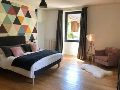 Un ou plusieurs lits dans un hébergement de l'établissement Chambres d’hôtes Les Mouillères