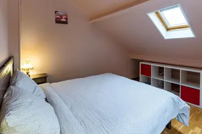 Un ou plusieurs lits dans un hébergement de l'établissement La Maisonnette