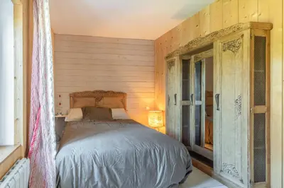 Un ou plusieurs lits dans un hébergement de l'établissement Petite Maison de Jeanne - Corps de ferme rénové