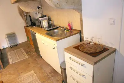 Cuisine ou kitchenette dans l'établissement Studio Mésange