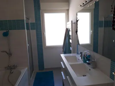 Salle de bains dans l'établissement Le Clos des Roses