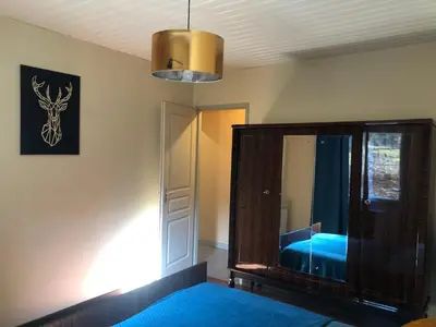 Un ou plusieurs lits dans un hébergement de l'établissement Gite de la cascade