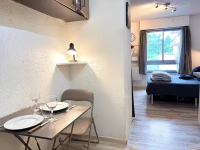 Un ou plusieurs lits dans un hébergement de l'établissement Les Logis de Paray appartement n2