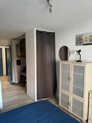 Un ou plusieurs lits dans un hébergement de l'établissement Les Logis de Paray appartement n2