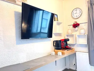 Cuisine ou kitchenette dans l'établissement Les Logis de Paray appartement n2