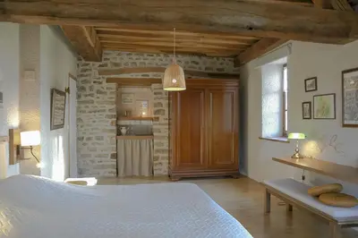 Un ou plusieurs lits dans un hébergement de l'établissement Au Grand Fête, B&B à la campagne