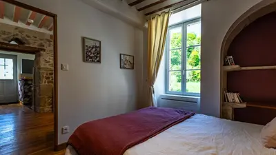 Un ou plusieurs lits dans un hébergement de l'établissement Le Moulin de L'O - L'Orle Rose