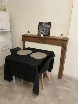 Cuisine ou kitchenette dans l'établissement Logement LECOURBE