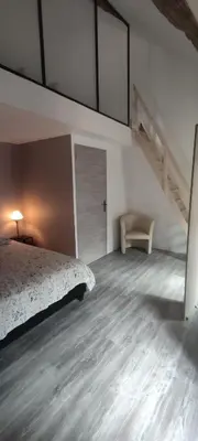 Un ou plusieurs lits dans un hébergement de l'établissement Gite rue Pasteur