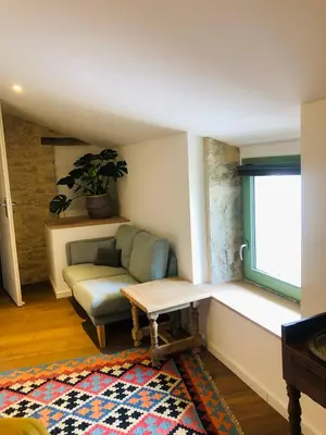 Coin salon dans l'établissement Le Gite de Tassigny