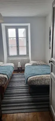 Un ou plusieurs lits dans un hébergement de l'établissement La Maison de Claire