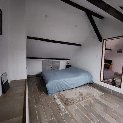 Un ou plusieurs lits dans un hébergement de l'établissement Maison Bourgogne