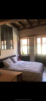 Un ou plusieurs lits dans un hébergement de l'établissement Le Clos de Melanie