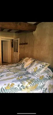 Un ou plusieurs lits dans un hébergement de l'établissement Le Clos de Melanie