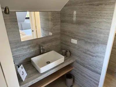 Salle de bains dans l'établissement Hameau Les Gaties