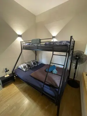 Un ou plusieurs lits dans un hébergement de l'établissement Appartement 6 personnes - Au coeur du centre ville