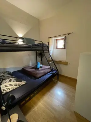 Un ou plusieurs lits dans un hébergement de l'établissement Appartement 6 personnes - Au coeur du centre ville