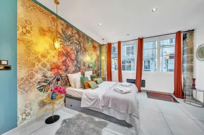 Un ou plusieurs lits dans un hébergement de l'établissement Aphrodite suite de prestige