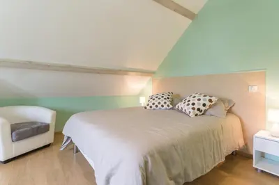 Un ou plusieurs lits dans un hébergement de l'établissement Maison Baduel