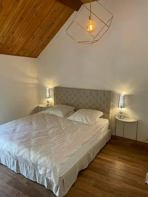 Un ou plusieurs lits dans un hébergement de l'établissement Maison de charme dans un cadre d'exception, 8 pers