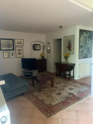 Coin salon dans l'établissement Ferienwohnung Jura Burgund