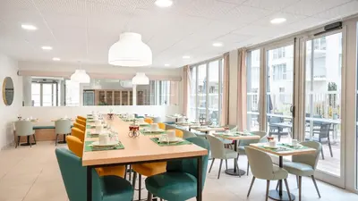 Restaurant ou autre lieu de restauration dans l'établissement Residhome Dijon Cité Des Vignes