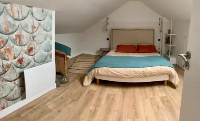 Un ou plusieurs lits dans un hébergement de l'établissement La Maison Laborey - Gîte du Plateau
