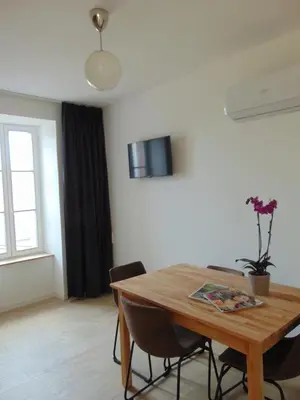Télévision ou salle de divertissement dans l'établissement Relais de la Diligence