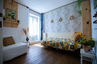 Un ou plusieurs lits dans un hébergement de l'établissement Ambiance Morvan