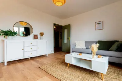 Coin salon dans l'établissement Le Jouvence Cozy - Confort - Zen - Parking gratuit