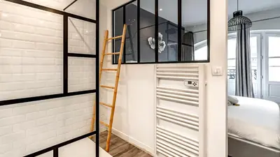 Un ou plusieurs lits dans un hébergement de l'établissement L'Escapade Urbaine - Cosy et central
