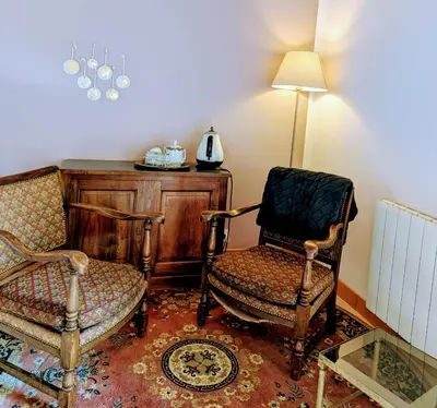 Coin salon dans l'établissement Maison d'hôtes Trip'n Touille