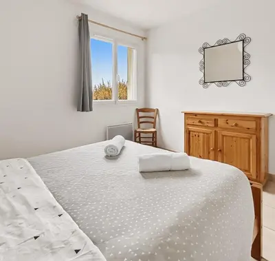 Un ou plusieurs lits dans un hébergement de l'établissement Belle Maison au Calme à Saint Martin du Tartre
