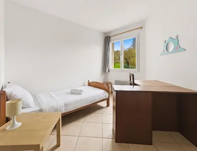 Un ou plusieurs lits dans un hébergement de l'établissement Belle Maison au Calme à Saint Martin du Tartre