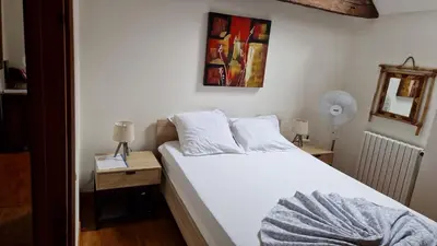 Un ou plusieurs lits dans un hébergement de l'établissement MAISON SYLVAIN