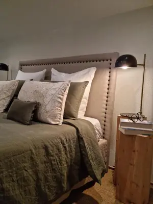 Un ou plusieurs lits dans un hébergement de l'établissement B&B à la campagne