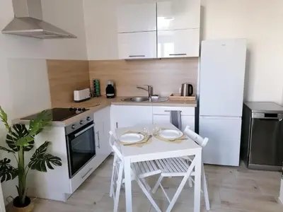 Cuisine ou kitchenette dans l'établissement Le manut, charme et confort
