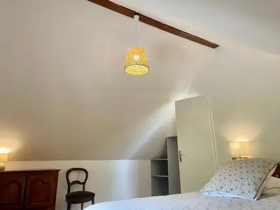 Un ou plusieurs lits dans un hébergement de l'établissement Maison Montcharmont