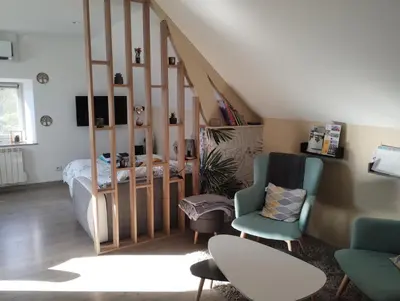 Coin salon dans l'établissement Le charmillon, Appartement cosi avec double garage
