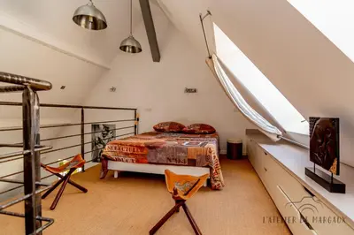 Un ou plusieurs lits dans un hébergement de l'établissement Superbe Loft, Chalon sur Saône