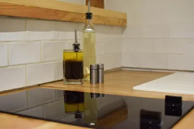 Cuisine ou kitchenette dans l'établissement Studio au Moulin 