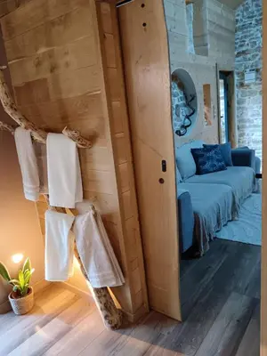 Un ou plusieurs lits dans un hébergement de l'établissement Domaine Moulin de Quincenat