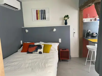 Un ou plusieurs lits dans un hébergement de l'établissement Studio 2 pers ou Appartement 4-7 pers Quartier Cathédrale