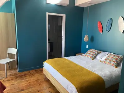 Un ou plusieurs lits dans un hébergement de l'établissement Studio 2 pers ou Appartement 4-7 pers Quartier Cathédrale