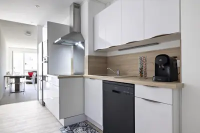 Cuisine ou kitchenette dans l'établissement LE COOL LEVEL
