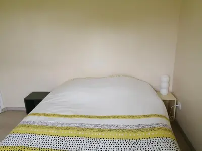 Un ou plusieurs lits dans un hébergement de l'établissement Chambre campagne uxelloise