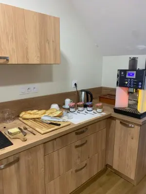 Cuisine ou kitchenette dans l'établissement Le Faubourg - Gîte et chambres d'hôte
