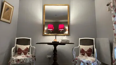 Coin salon dans l'établissement Les Colombages