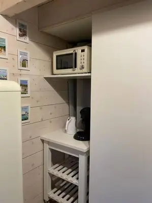 Cuisine ou kitchenette dans l'établissement La petite maison d’Orphée
